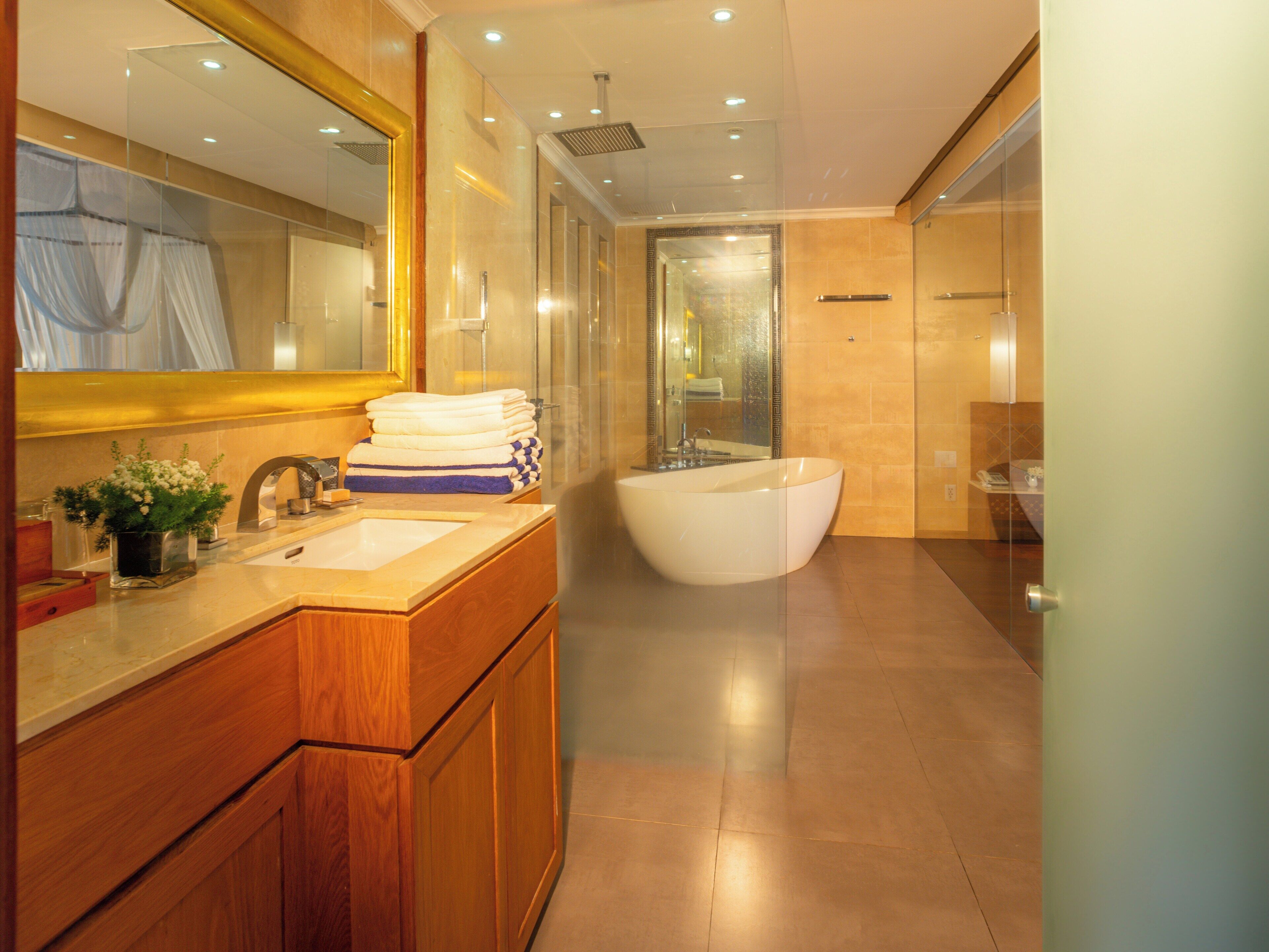pool view suite | bathroom | free toiletries, hair dryer, bathrobes, slippers