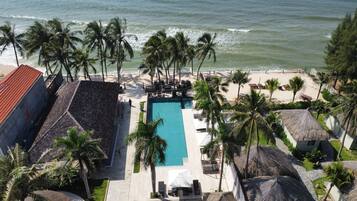 On the beach, white sand, beach towels