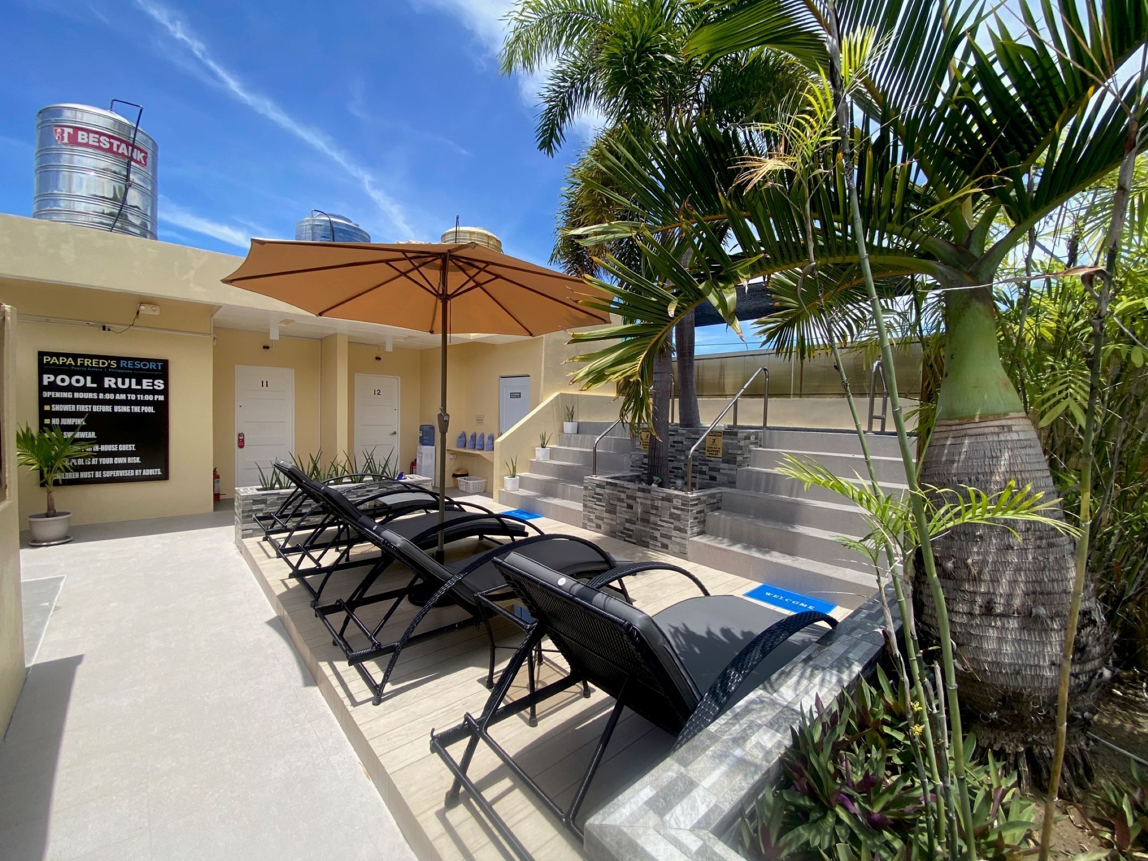 Outdoor pool, open 8:00 AM to 11:00 PM, pool loungers