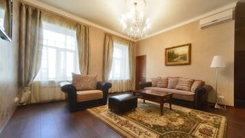 Premier Suite, 1 Bedroom | Living area | LED TV