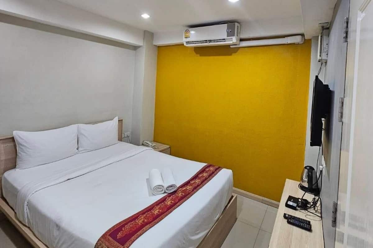 Quarto standard | Cofres nos quartos, cortinas blackout, Wi-Fi de cortesia, roupa de cama