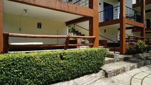 A multi-level building with a staircase leading to the upper floors. - Bakasyunan Resort Tanay (Tanay)
