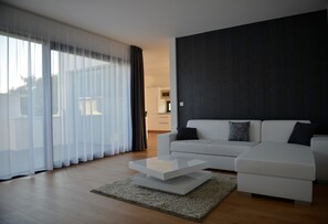 Luxury Duplex, 1 Bedroom, Kitchen, City View | Living room | Flat-screen TV - Apartmány Eden (Luhacovice)