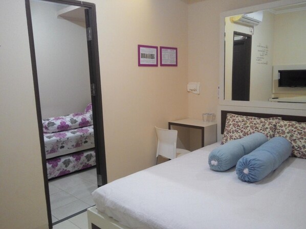 Desk, free WiFi, bed sheets