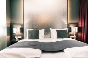 Premium bedding, minibar, in-room safe, individually decorated - Amedia Luxury Suites Graz, Trademark Collection by Wyndham (Graz)