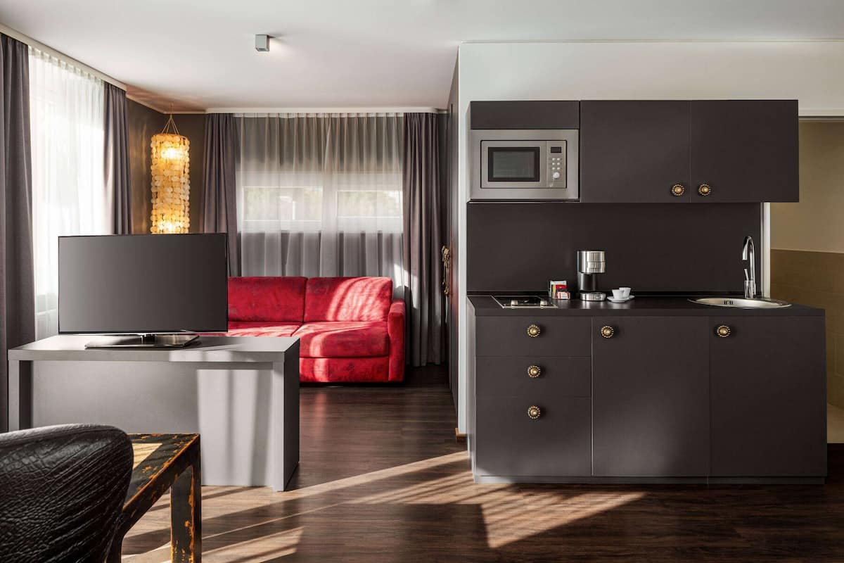 suite | premium bedding, minibar, in-room safe, individually decorated