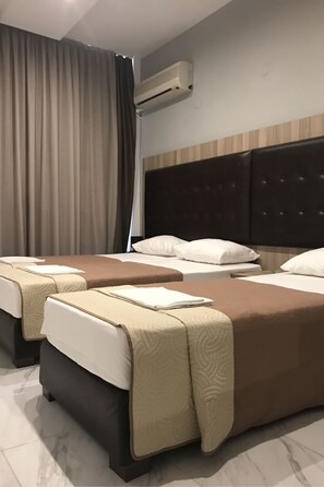 Chambre triple | Coffre-fort, système d’insonorisation, accès au Wi-Fi (inclus)