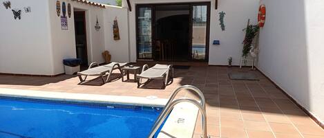 Outdoor pool, sun loungers