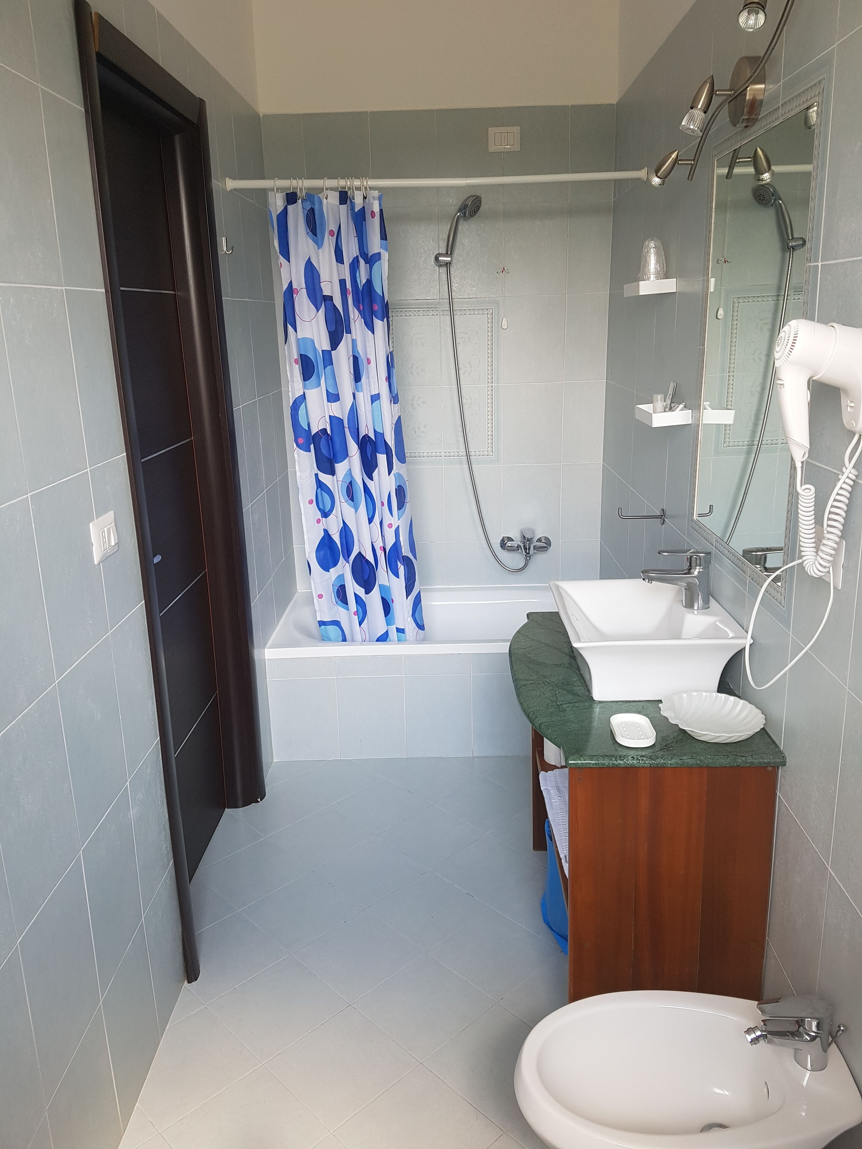 free toiletries, hair dryer, bidet, towels