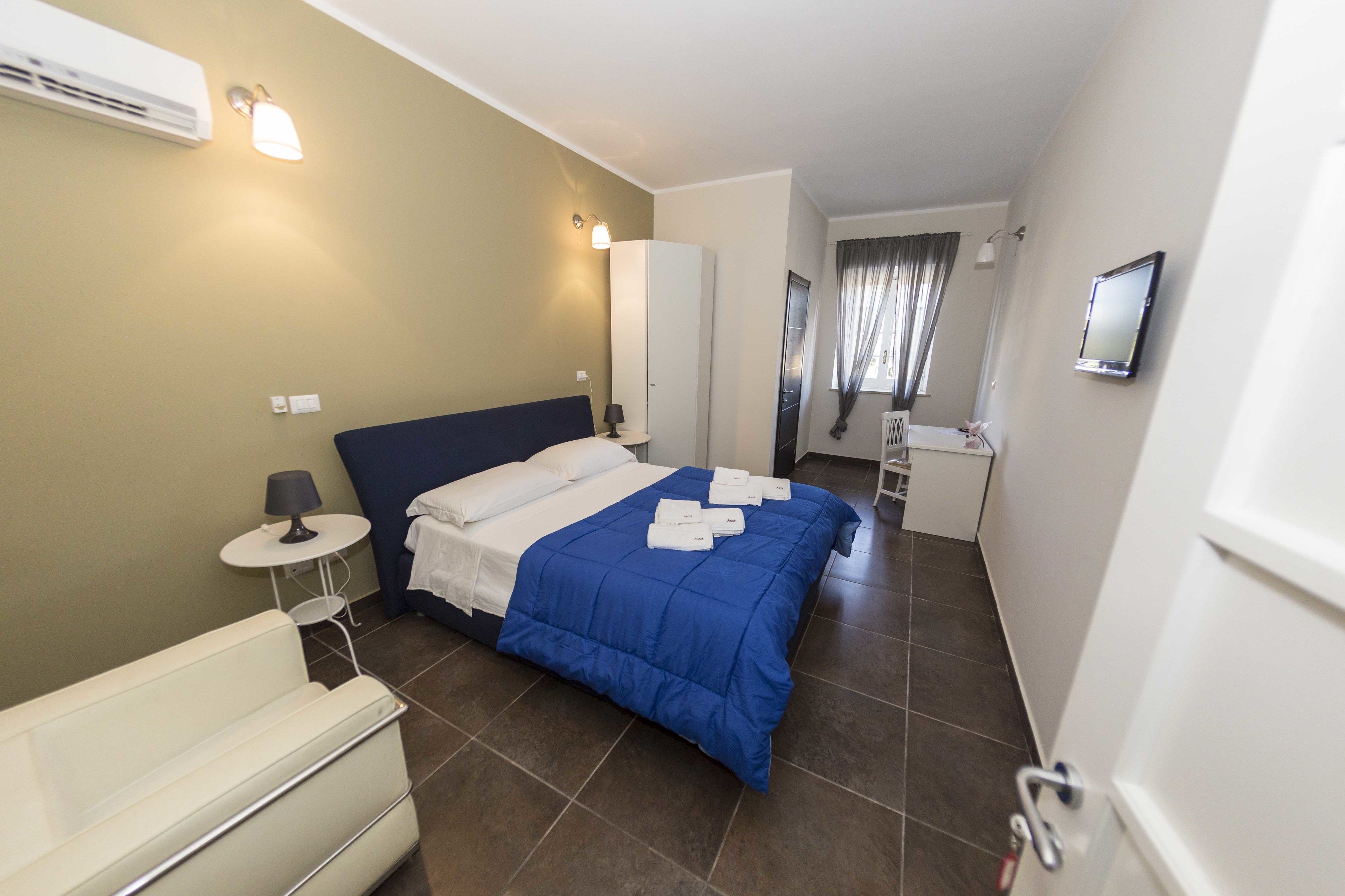 family room | premium bedding, down duvets, minibar, desk