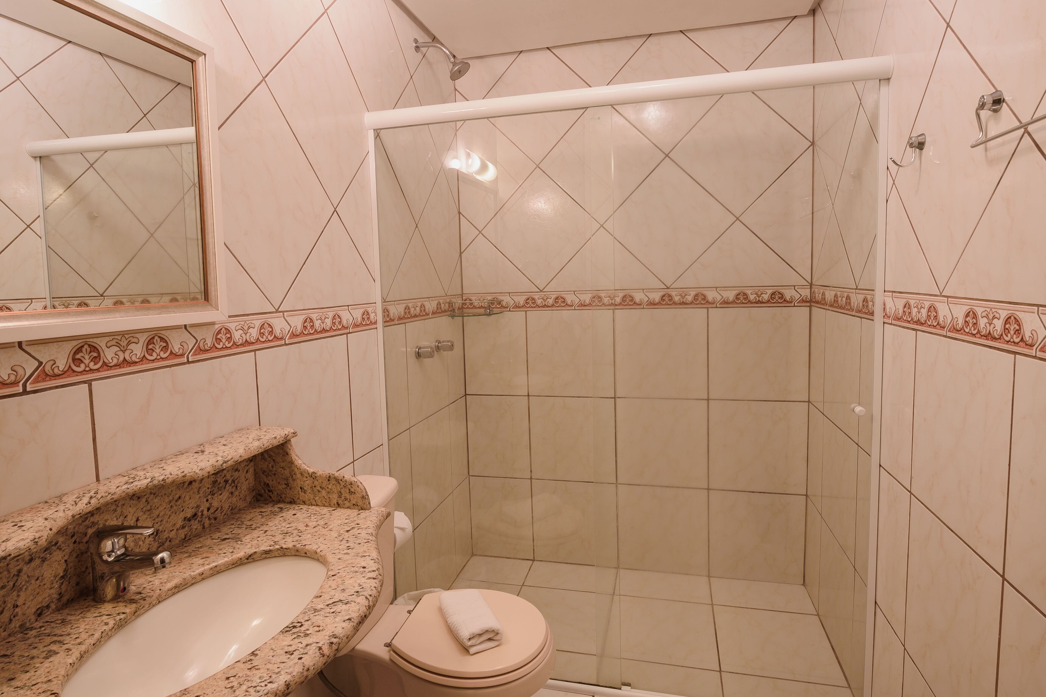 deluxe triple room | bathroom | free toiletries, hair dryer, bidet, towels