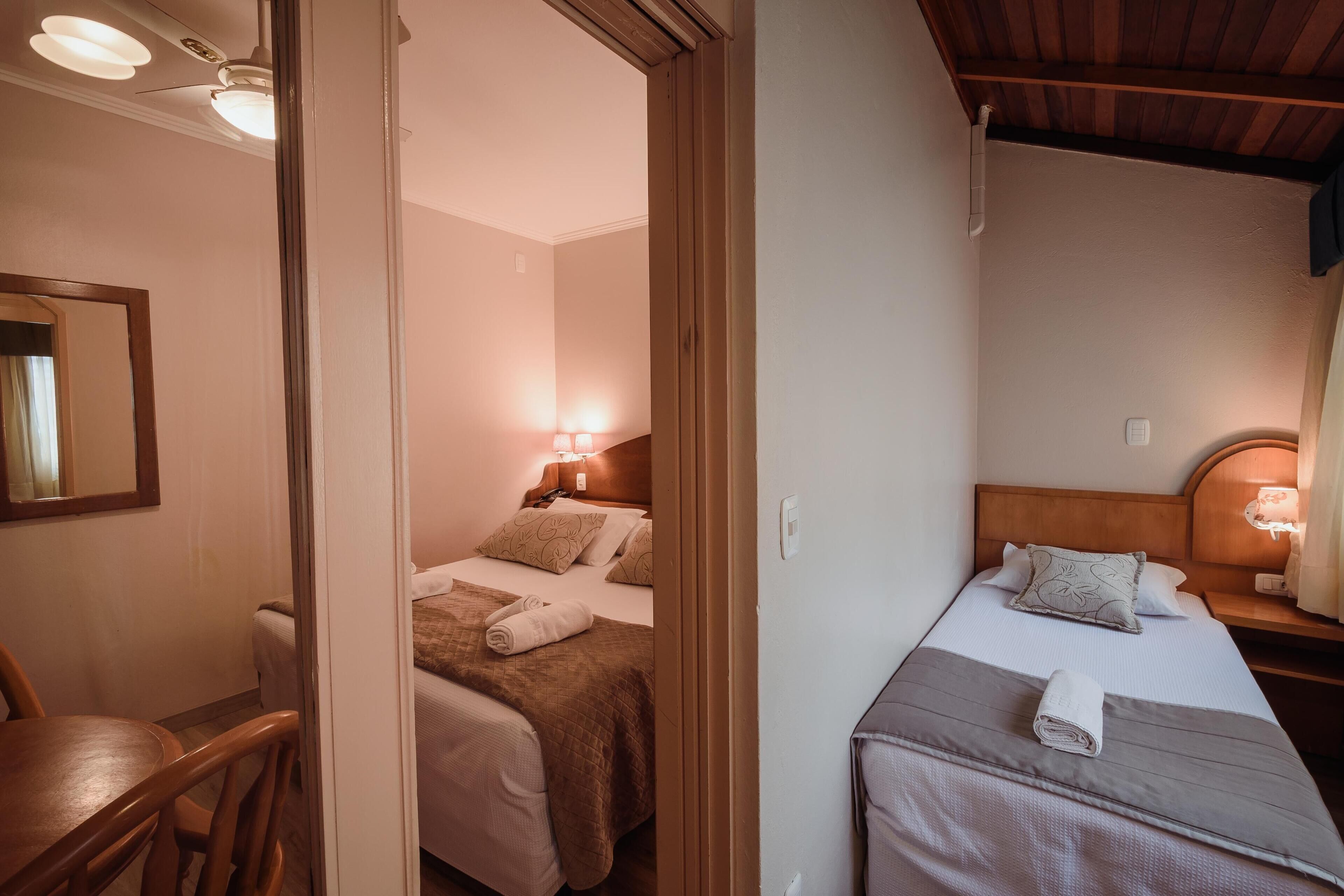 Frigobar, cortinas blackout, Wi-Fi de cortesia, roupa de cama