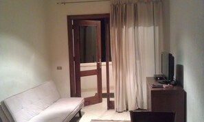 Double or Twin Room, Pool View | Living room