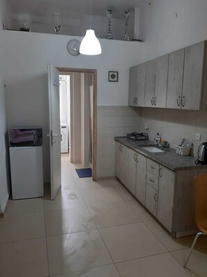 Classic-Vierbettzimmer, 1 Schlafzimmer, Nichtraucher, Stadtblick | Wohnbereich