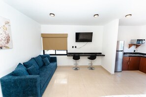 Departamento Elite | Tabla de planchar con plancha, wifi gratis y ropa de cama 