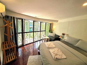 Standard Double Room, 1 Queen Bed, Private Bathroom, Garden View | Blackout drapes, iron/ironing board, free WiFi, bed sheets - Home16 Hostel 16 (Bangkok)