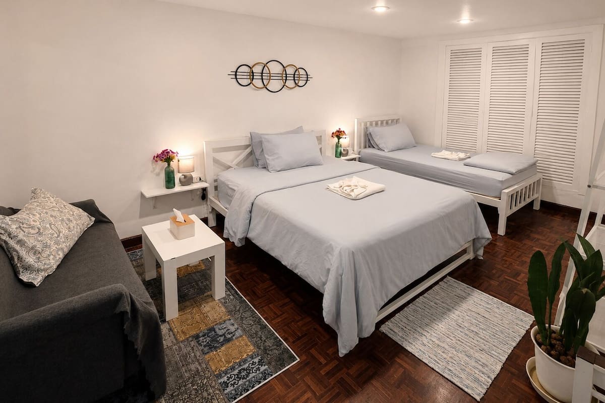 Standard Twin Room, Multiple Beds, Shared Bathroom | Blackout drapes, iron/ironing board (on request), WiFi (free)