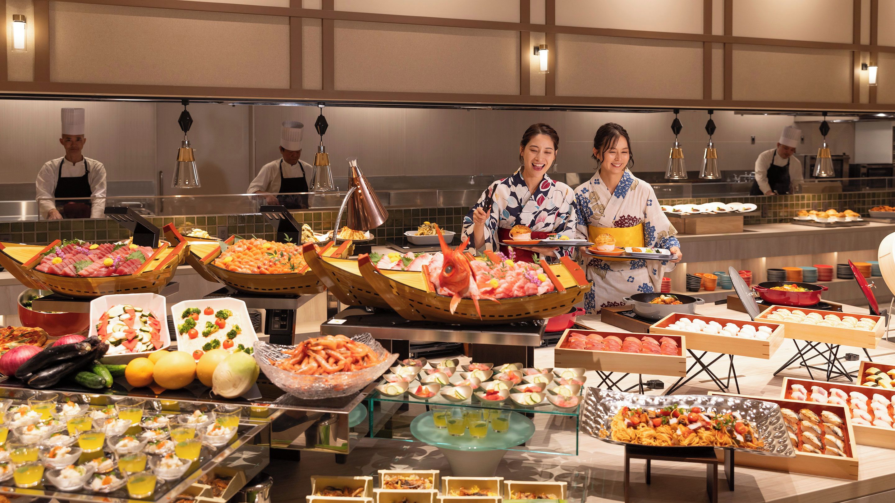 A buffet with various food items and chefs serving.