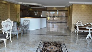 A spacious lobby with a reception desk, elegant seating, and a patterned rug. - Zeugma Park Hotel (Istanbul)