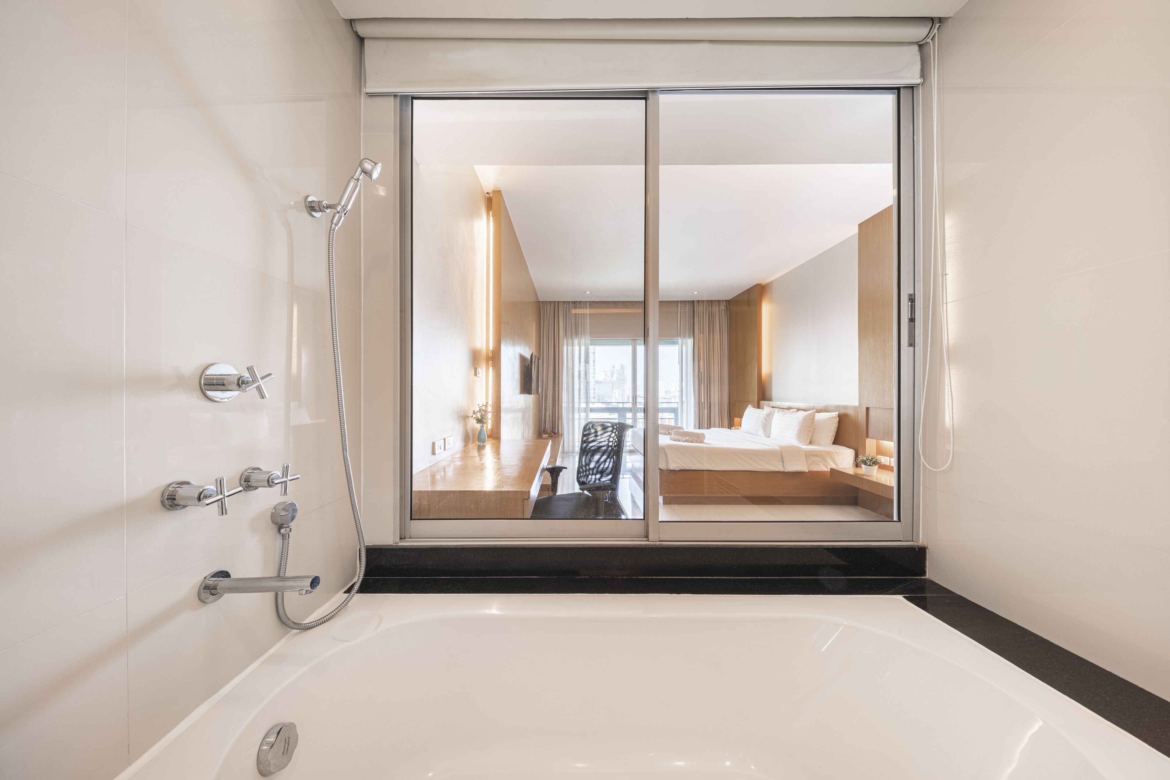 executive suite | bathroom | deep-soaking bathtub, free toiletries, hair dryer, towels