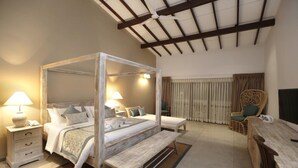 A four-poster bed with a wooden frame, bedside tables with lamps, a bench, a wicker chair, and a wooden desk. - The Beach Boutique Hotel (Uswetakeiyawa)