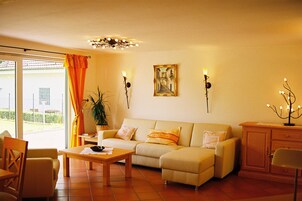 Junior Suite | Living area | Flat-screen TV