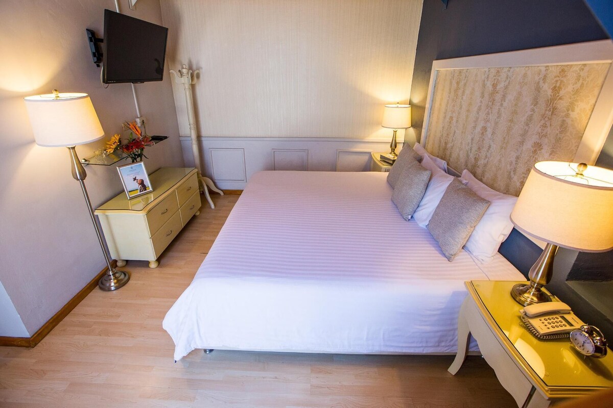 Premium bedding, down comforters, in-room safe, desk