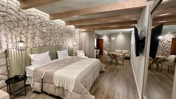Suite Queen com Banheira de Hidromassagem | Premium bedding, minibar, desk, laptop workspace