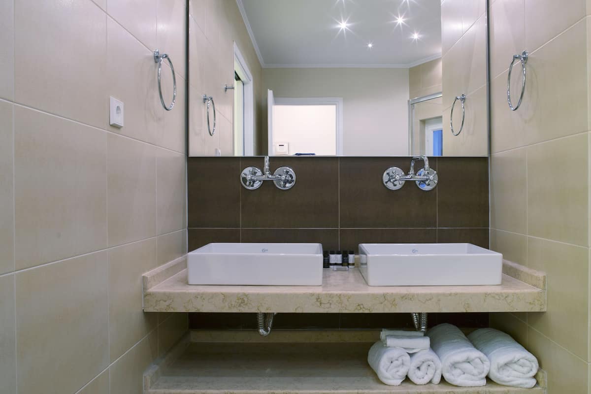 shower, designer toiletries, hair dryer, bathrobes