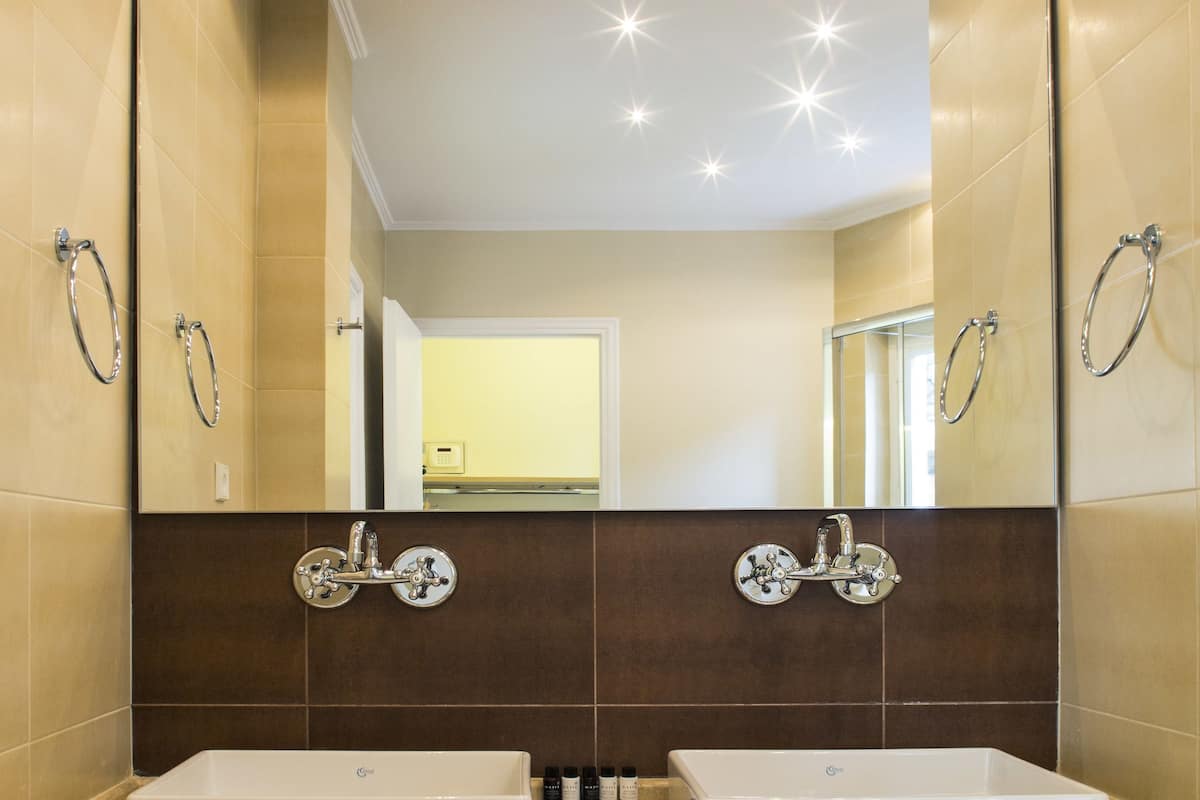 shower, designer toiletries, hair dryer, bathrobes