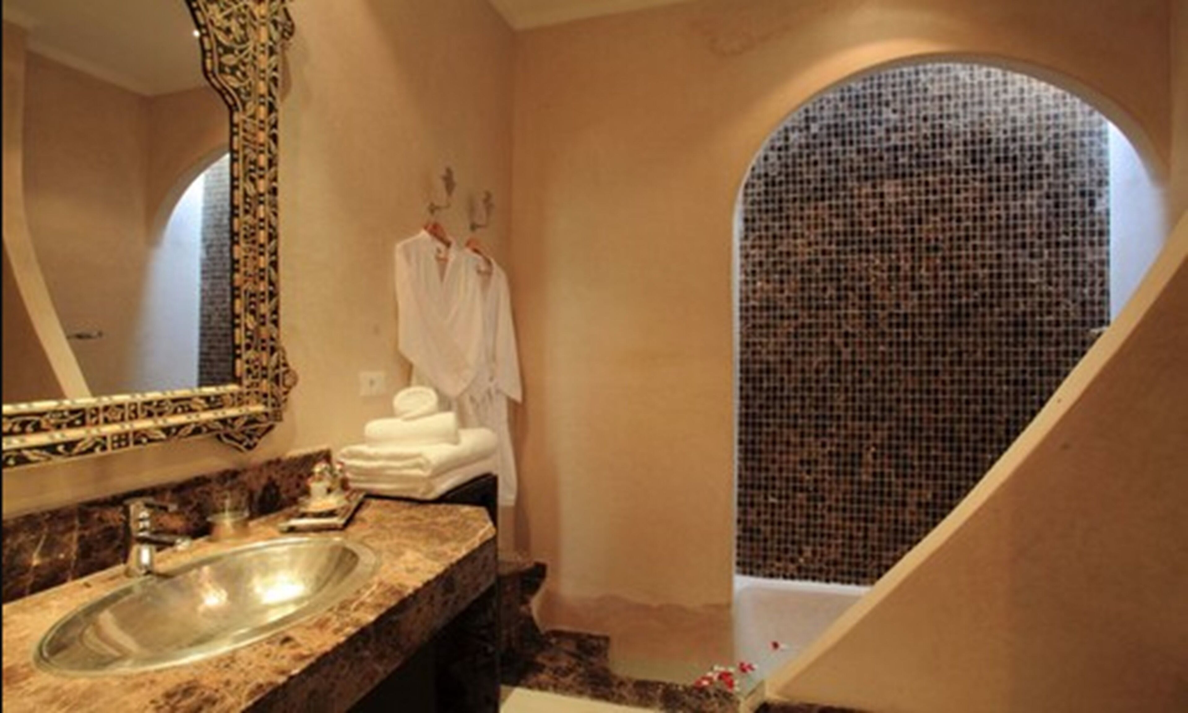 junior suite | bathroom | shower, free toiletries, hair dryer, bathrobes