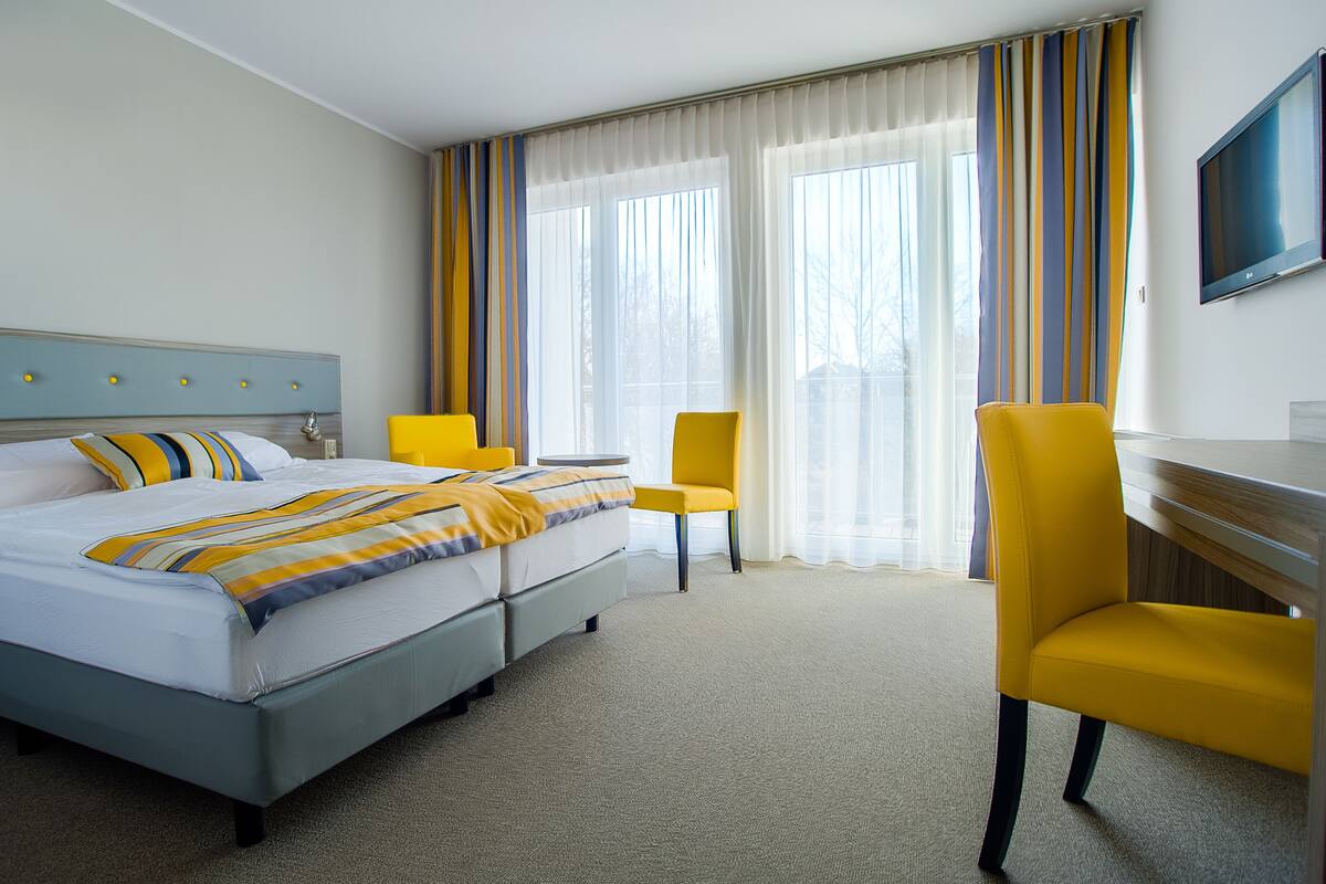 double or twin room | premium bedding, in-room safe, desk, iron/ironing board