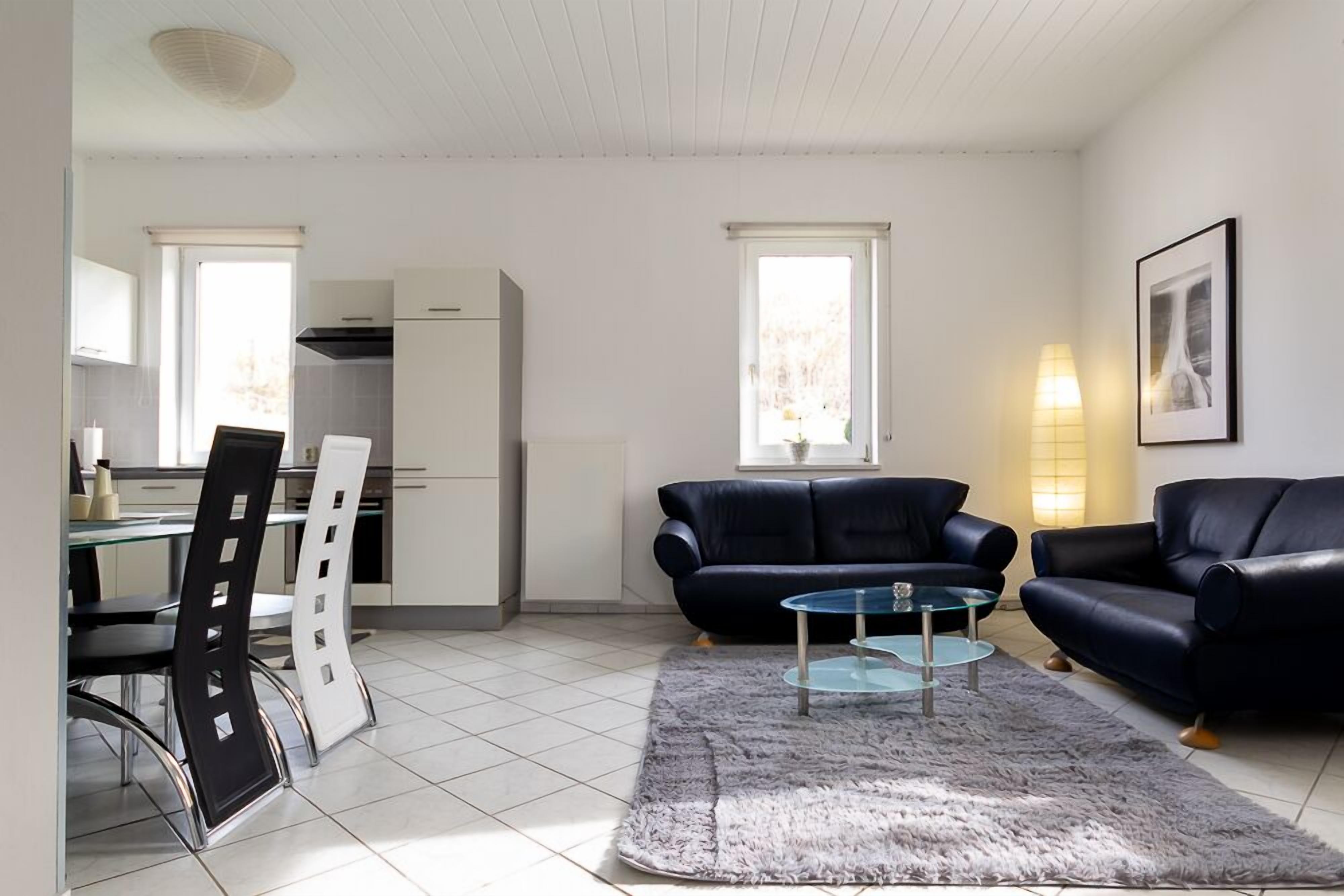 Familienapartment | Wohnbereich | 32-Zoll-Flachbildfernseher mit Kabelempfang