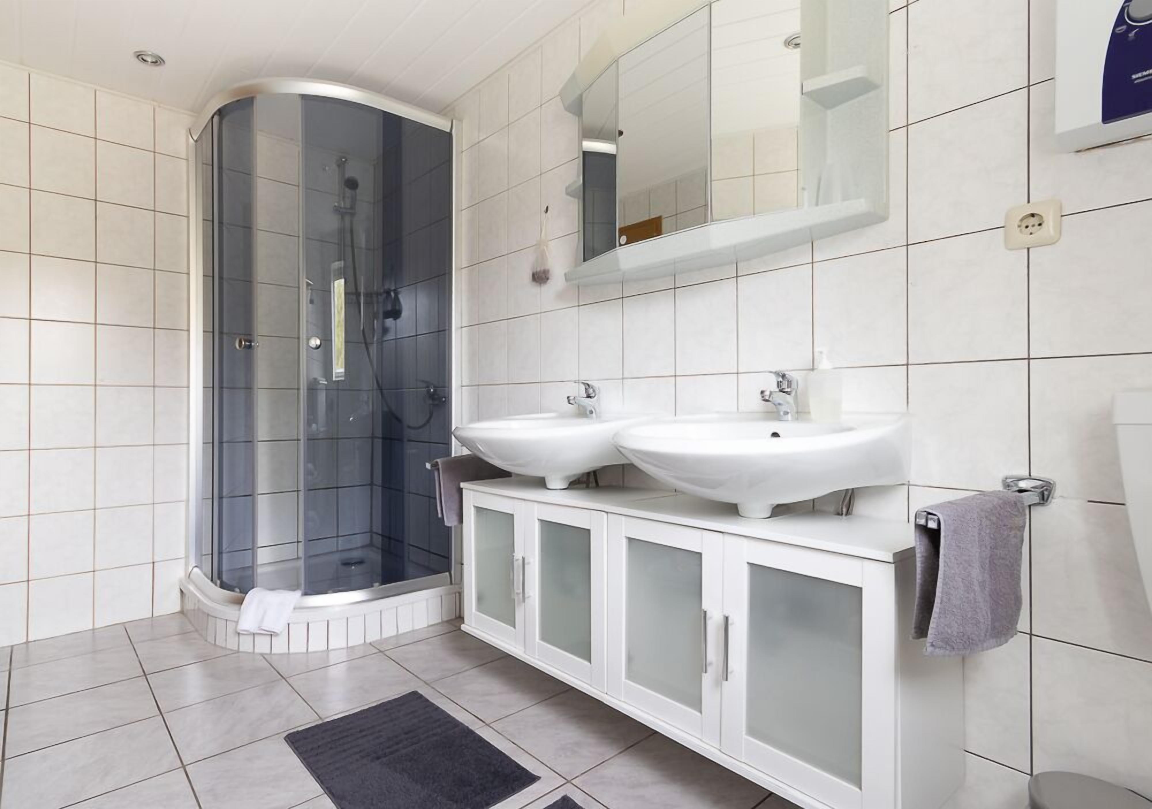 family condo | bathroom | shower, soap, shampoo, toilet paper