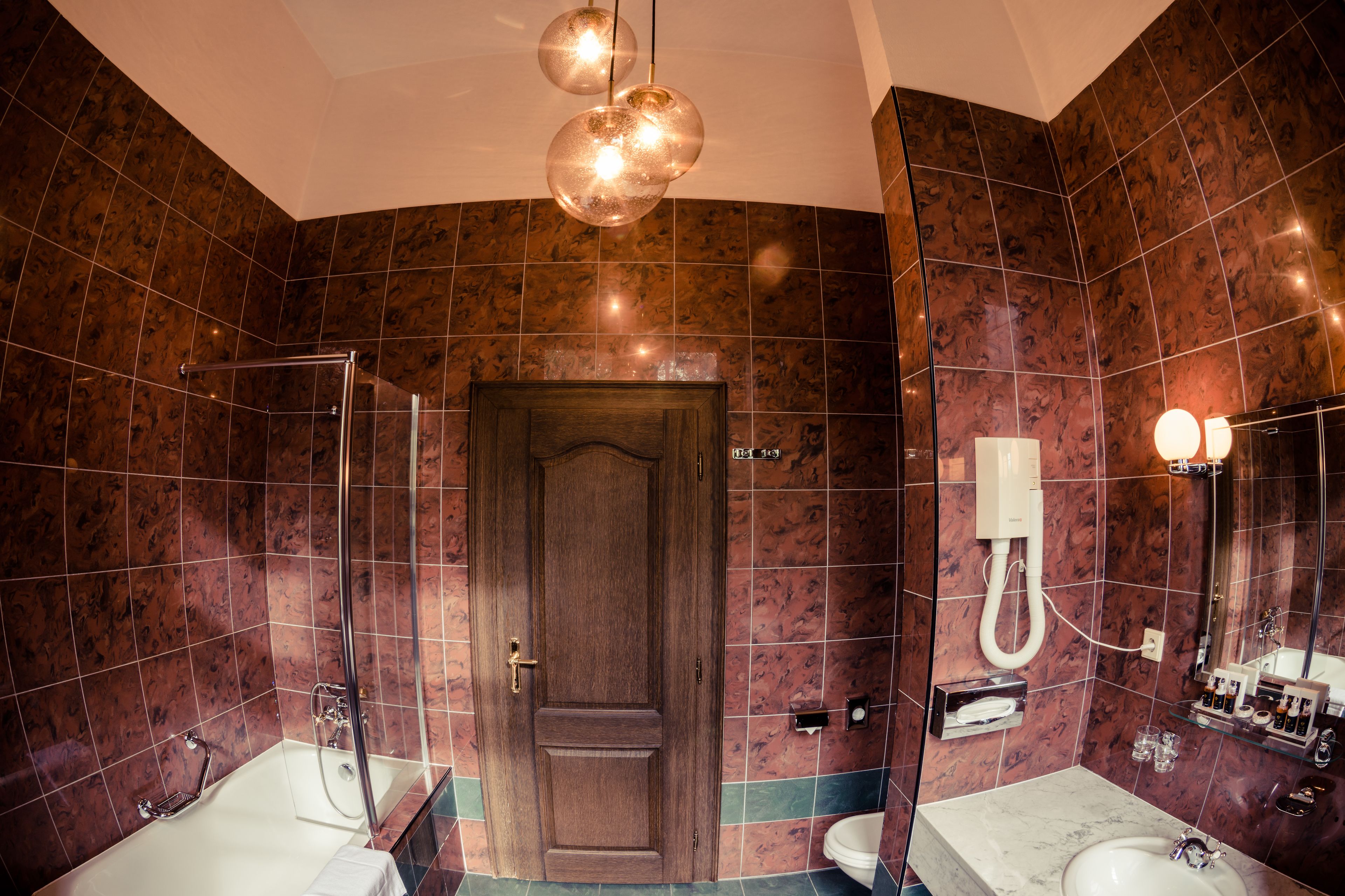 combined shower/bathtub, free toiletries, hair dryer, bathrobes