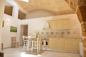 Apartment, 2 Bedrooms | Living area | 24-inch flat-screen TV with digital channels, TV