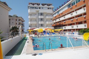 Outdoor pool, pool umbrellas, pool loungers