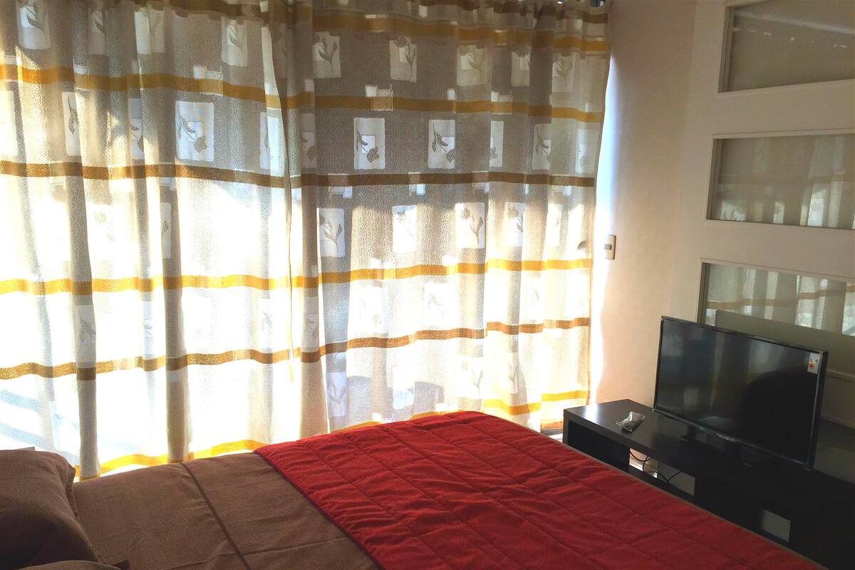Apartment, 1 Schlafzimmer | Wohnzimmer | 32-Zoll-Flachbildfernseher mit Kabelempfang, Fernseher, DVD-Player
