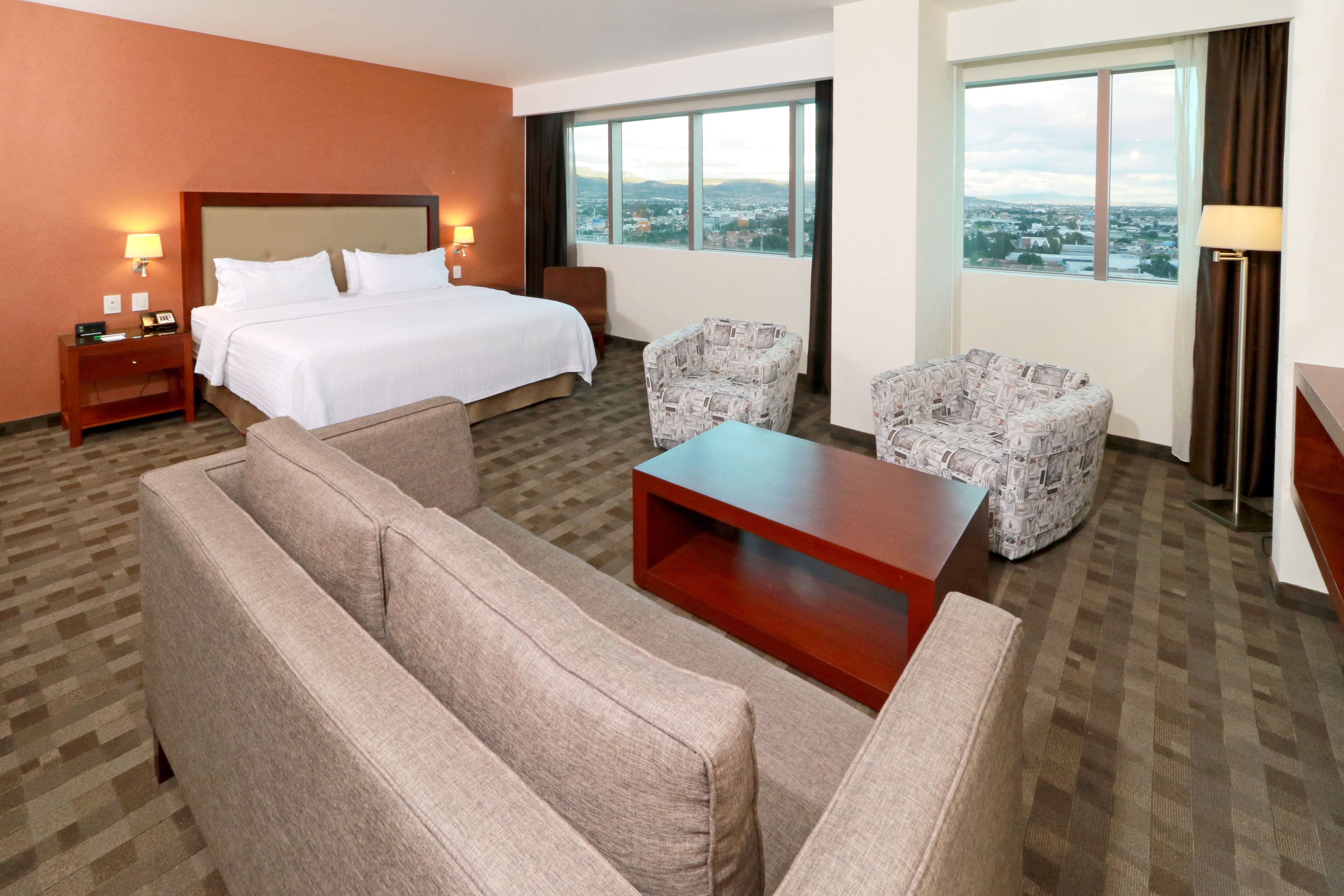 Suite, 1 King Bed | In-room safe, desk, laptop workspace, iron/ironing board