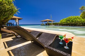 4 outdoor pools, an infinity pool, pool loungers