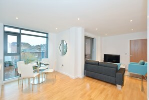 Deluxe Apartment, 1 Bedroom, Balcony | Living area