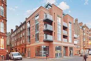 Front of property - evening/night - The Kensington Residencies (London)