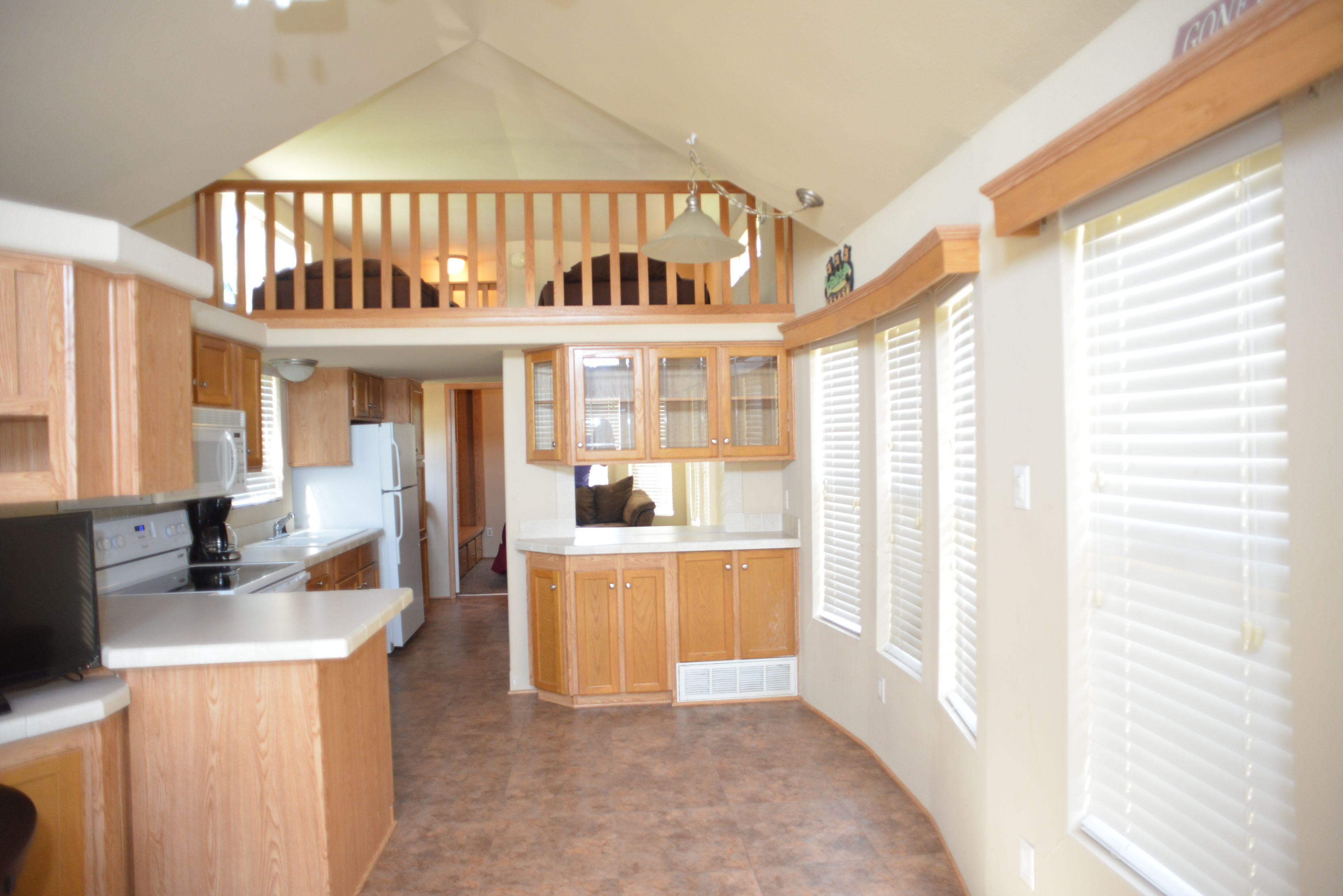 Deluxe Loft, 2 Bedrooms, Lake View | Private kitchen | Fridge, microwave, stovetop, coffee/tea maker