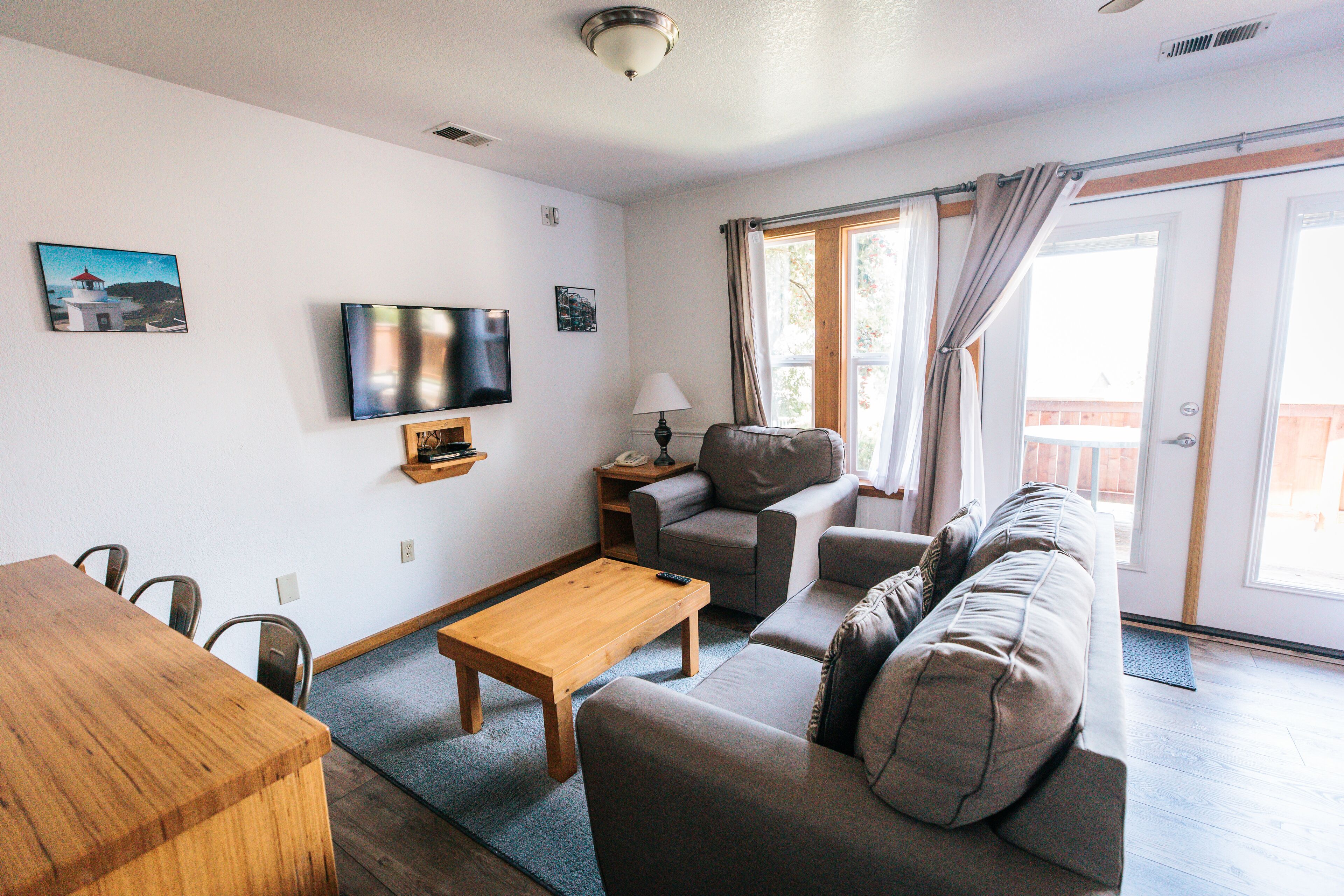 Standard Cottage, 2 Queen Beds | Living area | Flat-screen TV