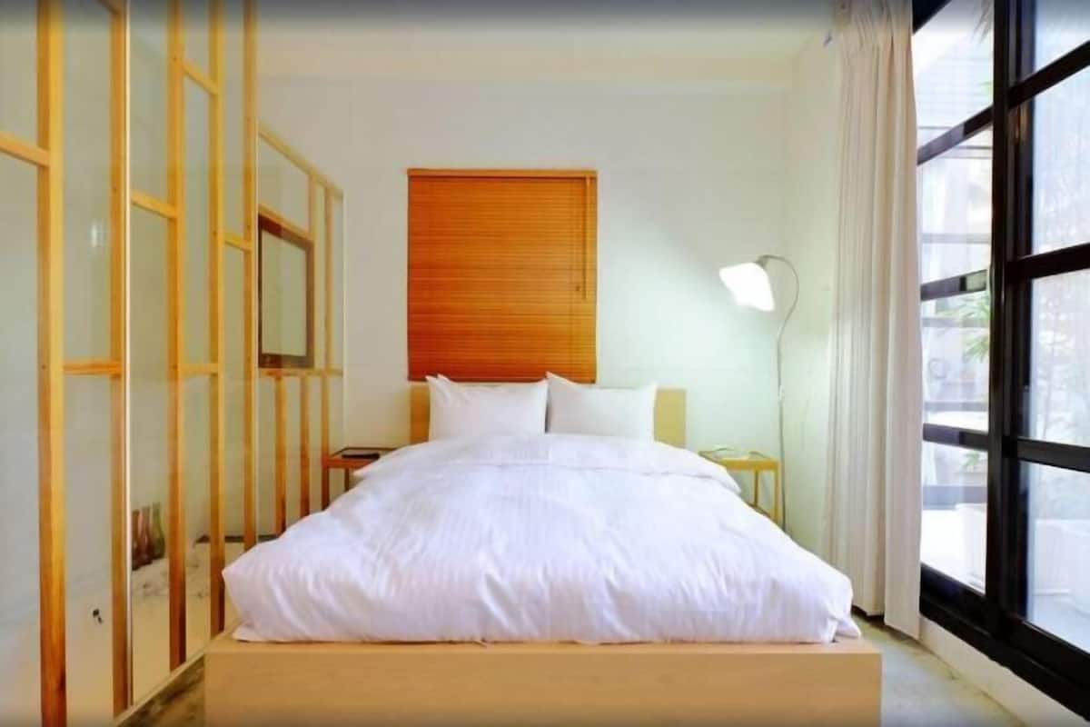 Premium bedding, down comforters, blackout drapes, WiFi (free)