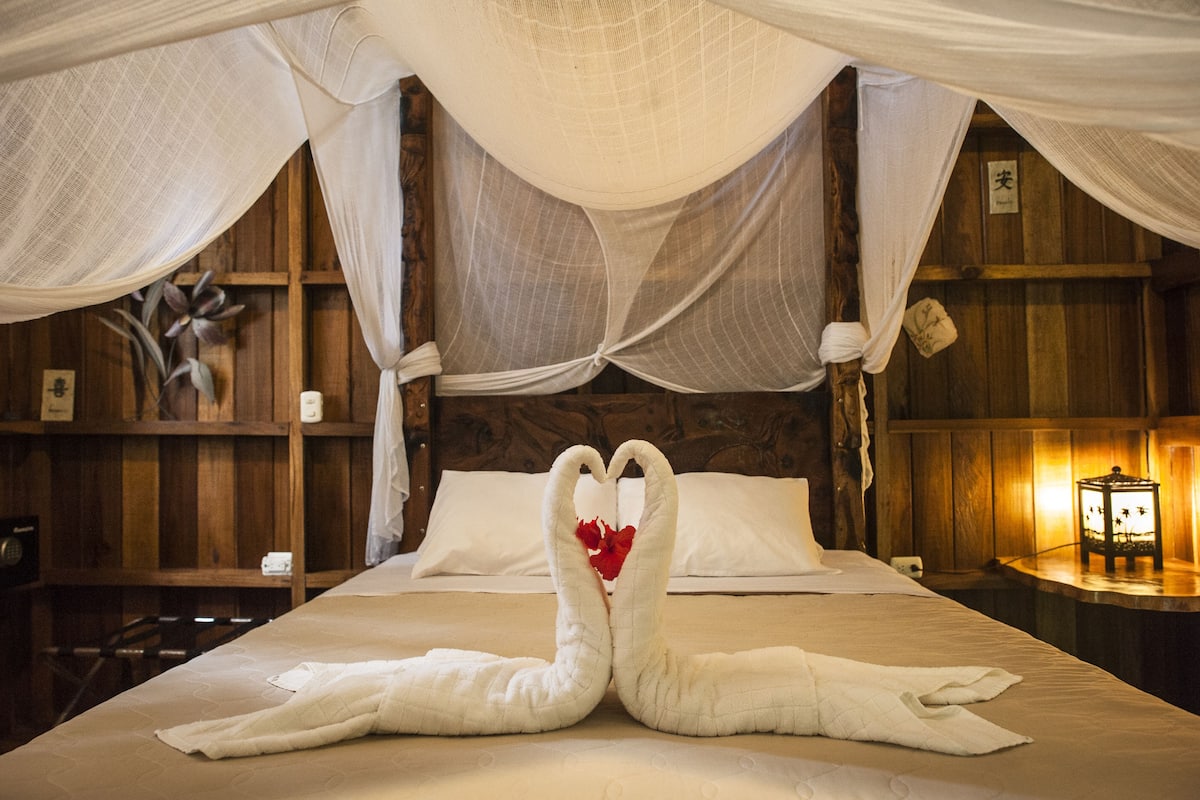 standard bungalow, 1 queen bed, balcony, garden area | 2 bedrooms, in-room safe, bed sheets