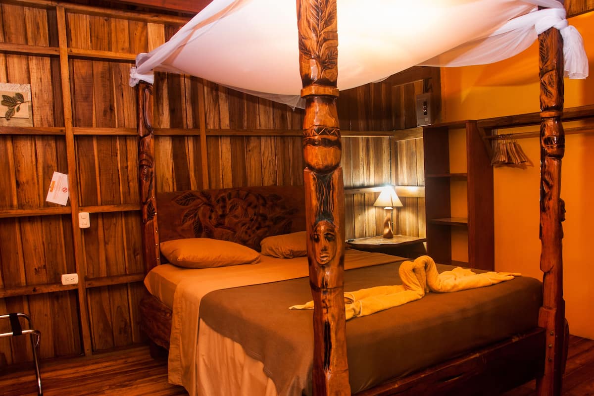 family bungalow, 2 bedrooms, balcony, garden area | 2 bedrooms, in-room safe, bed sheets