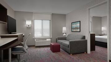 42-tums platt-tv med satellitkanaler, tv och en mp3-dockningsstation