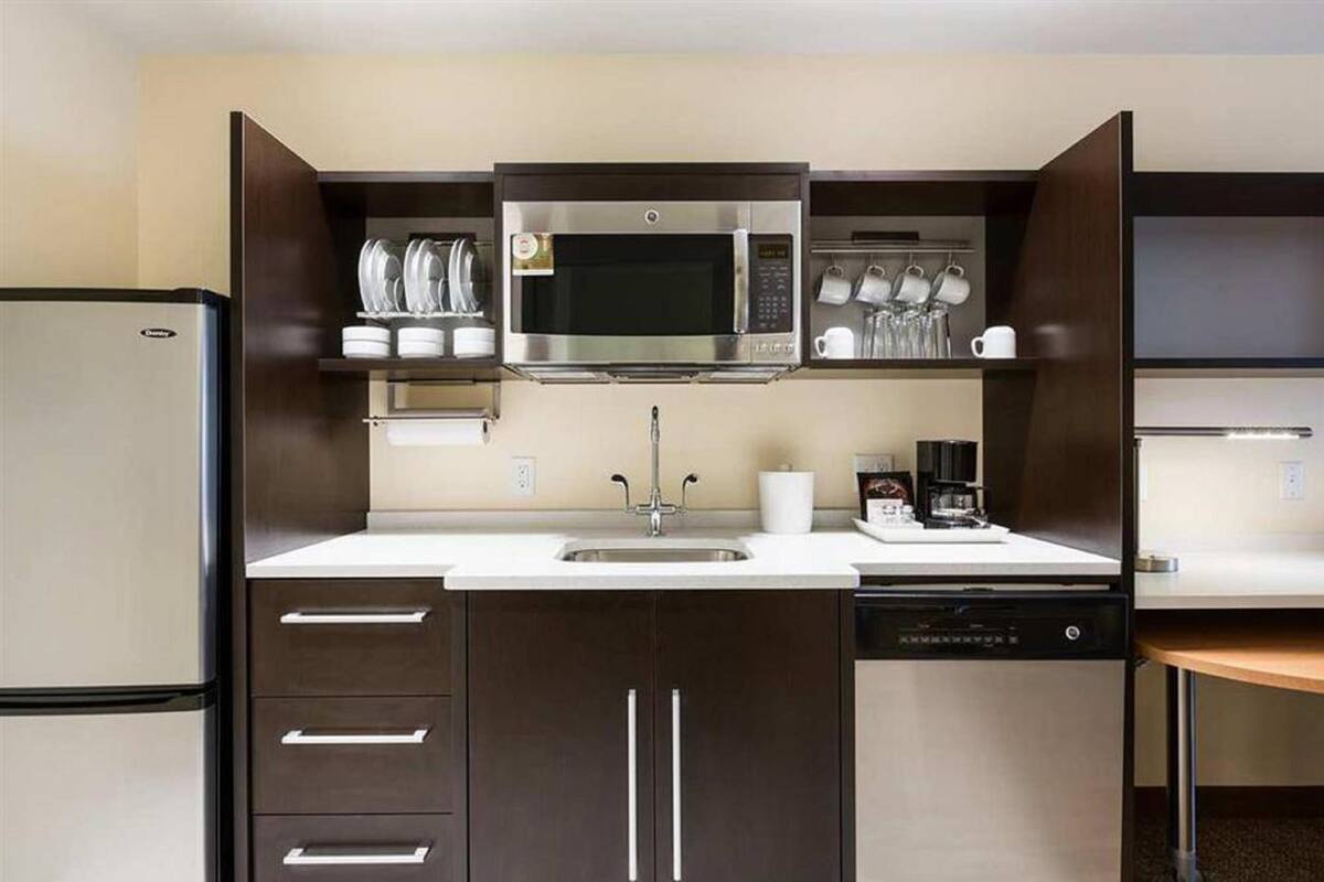 full-sized fridge, microwave, dishwasher, coffee/tea maker