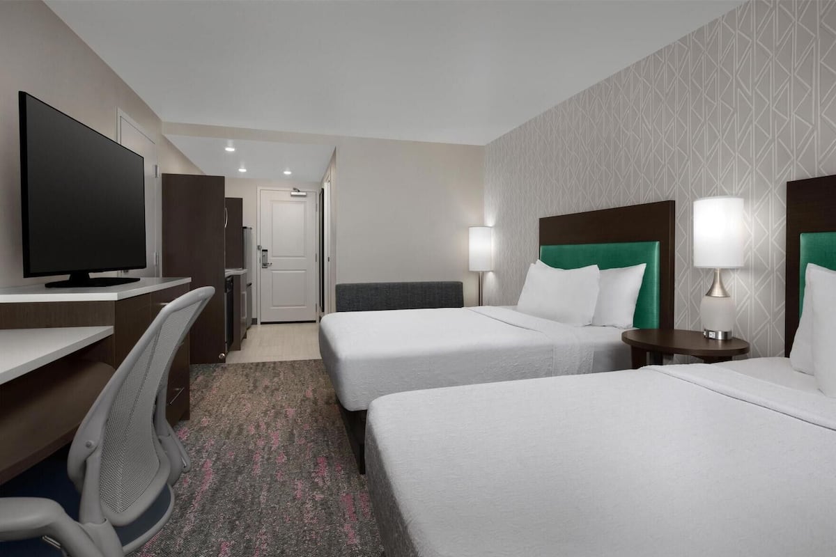 Hypo-allergenic bedding, in-room safe, desk, laptop workspace